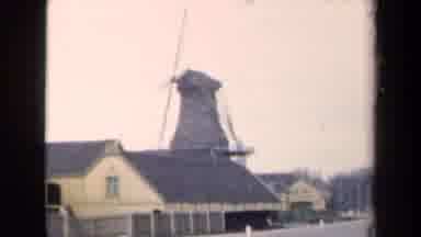 Netherlands (1946): Many Historic Looking Buildings And A Small Windmill Dot The