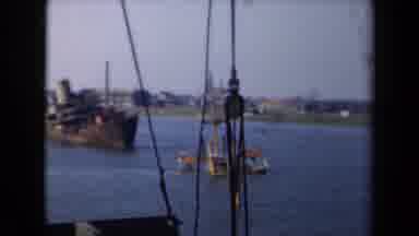 Netherlands (1946): Ship Or Boat Approaching What Appears To Be A Old Damaged Ship