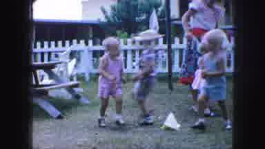 Kansas City Missouri (1959): A Group Of Little Kids Playing In Their Spring