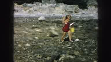 Kansas City Missouri (1959): Child Playing On A Beach