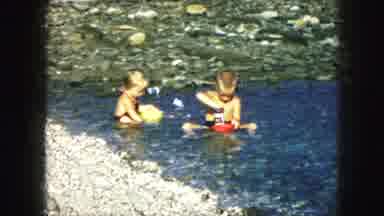 Kansas City Missouri (1959): Two Kids Playing And Swimming