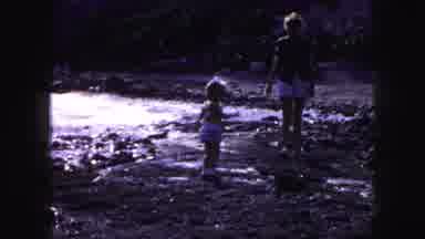 Kansas City Missouri (1959): Girl Stands Up Near River To Follow Her Mom Away