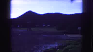 Kansas City Missouri (1959): A View Of A Dark Blue Isolated Forest With A Small