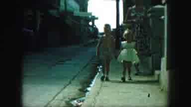Kansas City Missouri (1959): Young Boy And Girl Walking Hand In Hand Down Street