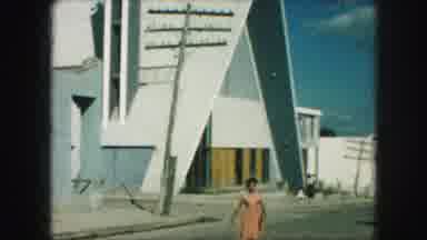 Kansas City Missouri (1959): Woman Walking From Triangle Shaped Building In The