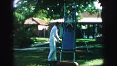 Kansas City Missouri (1959): Children Playing On A Slide And Seesaw With Their