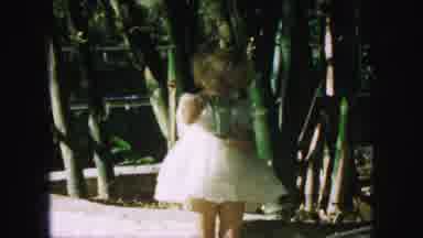 Kansas City Missouri (1959): Young Blond Girl Wearing Dress Drinking From A Glass