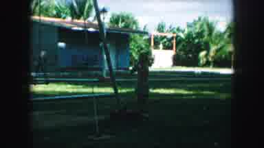 Kansas City Missouri (1959): A Mother And Child Play In A Park On A Slide