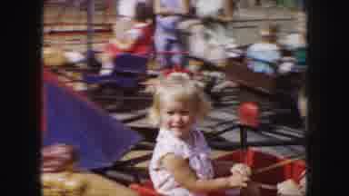 Kansas City Missouri (1959): Children Playing On A Merry Go Round And Having Fun