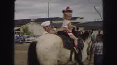 Kansas City Missouri (1959): Child Riding A Horse A Navy Man Walking Along While