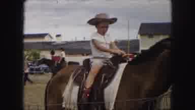 Kansas City Missouri (1959): Two Kids Are Sitting On The Horseback In The Arena