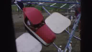 Kansas City Missouri (1959): People Having Fun On An Airplane Ride At An Amusement