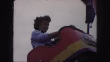 Kansas City Missouri (1959): Woman With Friends And People Riding A Roller Coaster