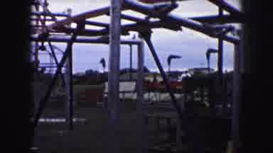 Kansas City Missouri (1959): A View Of People Riding A Rollercoaster At An