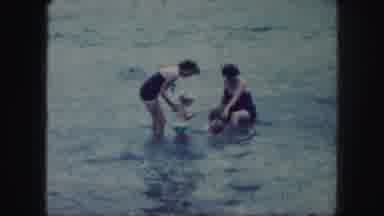 Kansas City Missouri (1959): Here Are Two Moms And Children Playing In The River