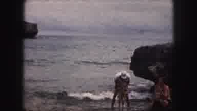 Kansas City Missouri (1959): Mother And Father Play In The Ocean With Their Young