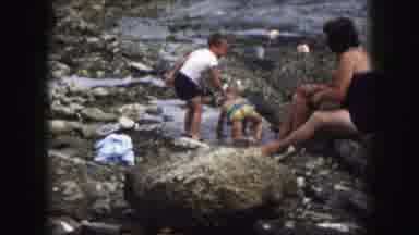 Kansas City Missouri (1959): Adults And Children At The Beach Playing In The Water