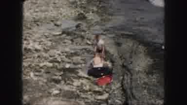 Kansas City Missouri (1959): Two Children Playing With Toys By A Creek
