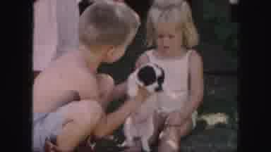 Kansas City Missouri (1959): Blonde Little Boy Handing Blonde Little Girl A New