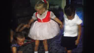 KANSAS CITY MISSOURI-1959: Children Playing Together Girl In Red And White Dress
