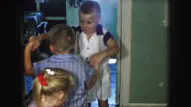 Kansas City Missouri (1959): Five Young Children Playing Around With Each Other In
