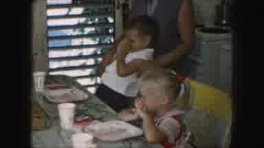 Kansas City Missouri (1959): Young Children Sitting Around A Kitchen Table Praying