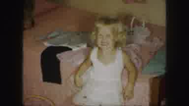 Kansas City Missouri (1959): A Little Boy Puts On His Shirt After Helping Her