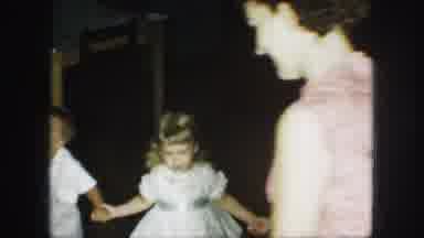 Kansas City Missouri (1959): Young Children In Sunday Clothes Playing A Game With