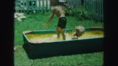Kansas City Missouri (1959): Two Kids Playing Around In Small Dirty Pool In