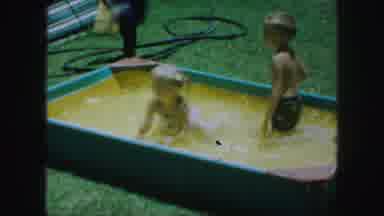 Kansas City Missouri (1959): Boy And Girl Frolic In Homemade Shallow Swimming Pool