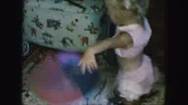 Kansas City Missouri (1959): A Girl And Boy Bounce Two Balls Next To Each Other