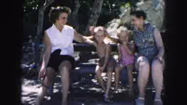 Kansas City Missouri (1959): A Mother Enjoying A Day With Her Children On A Bench