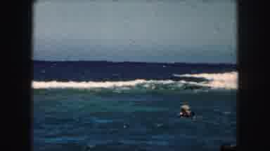 Kansas City Missouri-1959: Family At The Beach Swimming In The Ocean