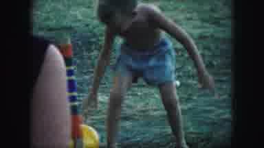 Kansas City Missouri (1959): Child Has Fun With Ball At Outside Gathering With