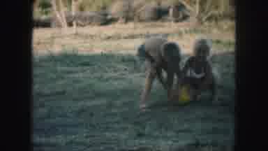 Kansas City Missouri (1959): Two Young Children Play And Fight Over Bouncy Ball At
