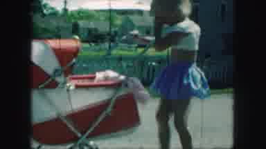 Kansas City Missouri (1959): A Little Girl Walking In High Heels Playing With Her
