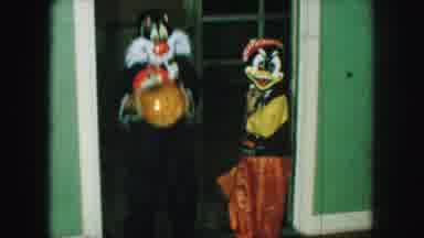KANSAS CITY MISSOURI-1959: Children In Halloween Costumes And Playing Hula Hoop