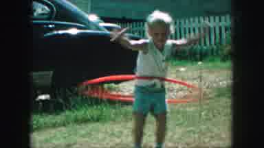 Kansas City Missouri-1959: Happy Child Plays With Hula Hoop On A Summer's Day