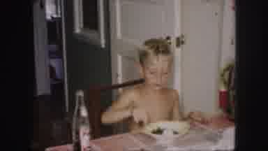 Kansas City Missouri (1959): Little Boy Coloring Easter Eggs At The Table With A