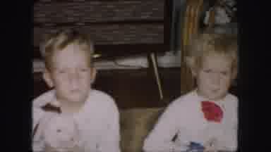 Kansas City Missouri (1959): Two Caucasian Kids Sitting Down And Posing And