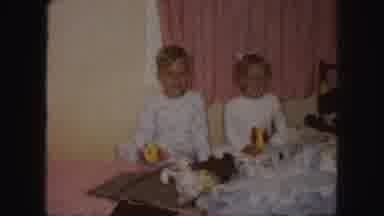 KANSAS CITY MISSOURI-1959: Young Boy And Girl Play With Toys And Smile For The Camera