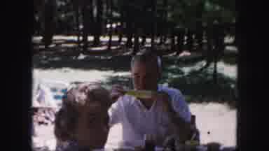 Kansas City Missouri (1959): An Older Couple A Woman In A Bonnet And A Baby Enjoy