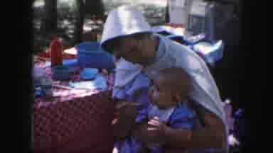 Kansas City Missouri (1959): A Mother Feeding Her Child