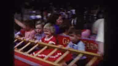 Kansas City Missouri (1959): Children At An Amusement Park Having Fun On Ride