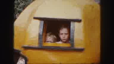 Kansas City Missouri (1959): Many Little Kids Riding Rides At Amusement Park