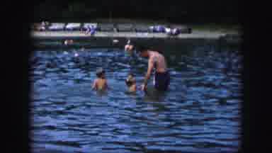 Kansas City Missouri (1959): Young Mother And Father Plays With Their Two Young