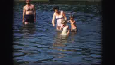 Kansas City Missouri (1959): A Family Playing Together In A Lake