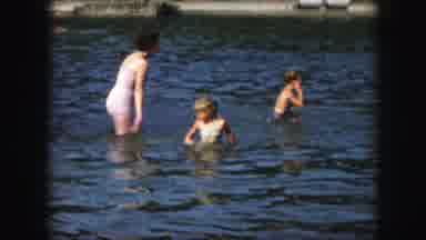 Kansas City Missouri (1959): Woman And Two Young Boys Playing And Swimming
