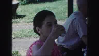 Kansas City Missouri (1959): Older Woman Drinking Looking At Camera Older Man