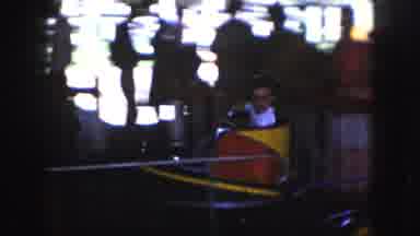 Kansas City Missouri (1959): Kids Riding On A Carnival Attraction With Some